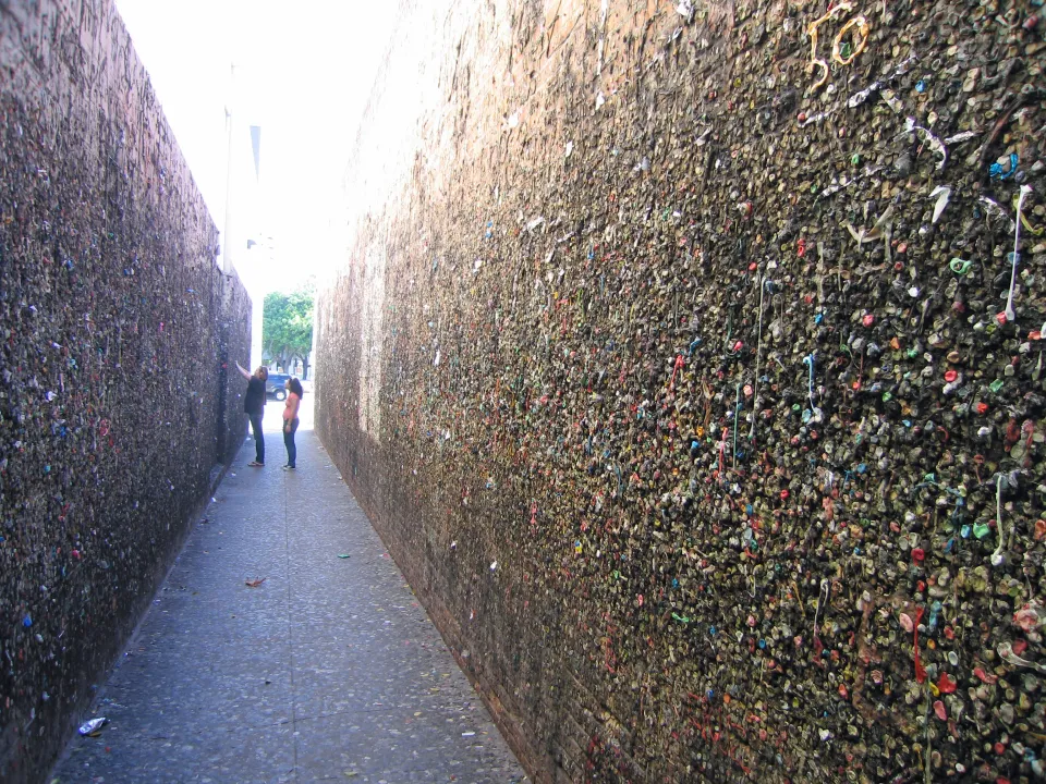 People exploring Bubblegum Alley in downtown San Luis Obispo